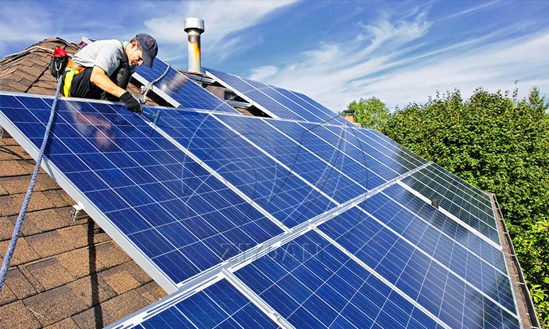 Residential ground mount solar racking system installed in a backyard garden for optimal tilt and orientation